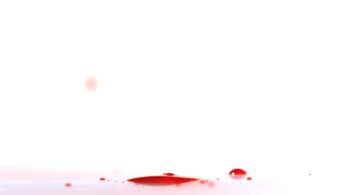Red Ink Bouncing On A Vibrating Surface