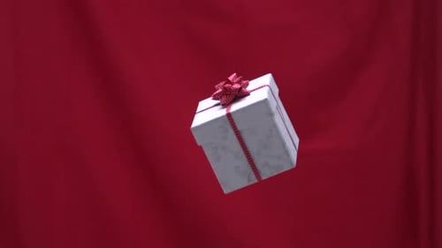 Floating Gift Box with Red Ribbon on Red