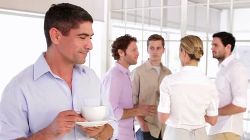 Business People Chatting During Coffee Break