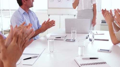 Adults Clapping During Office Presentation
