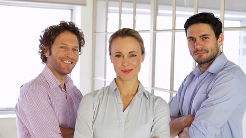 Confident Business Team Poses in Modern Office