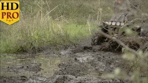 A 4x4 Offroad Vehicle Splunging on the Mud