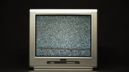 Vintage TV with Static Being Turned Off