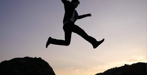 Asian Businessman Jumping