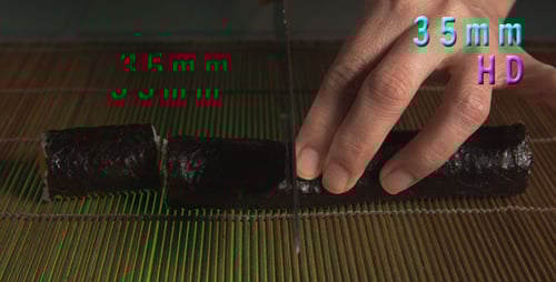 Chef Cuts Sushi Roll into Smaller Pieces