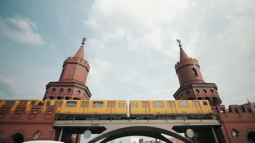 Low angle view of train moving on railway bridge