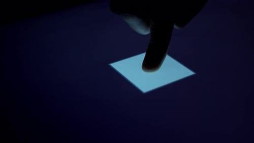 Finger Activates Glowing Computer Chip Graphic