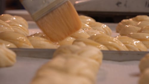 Braided Challah Bread Glazed for Baking Preparation