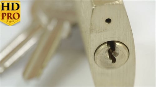 Macro View of Brass Padlock with Keys
