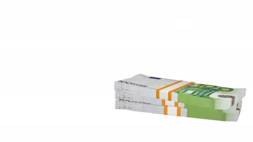 Many wads of money falling on table. 100 Euro banknotes.