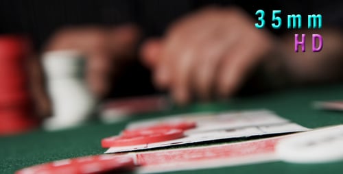 Hands Placing Bet at Card Game with Chips