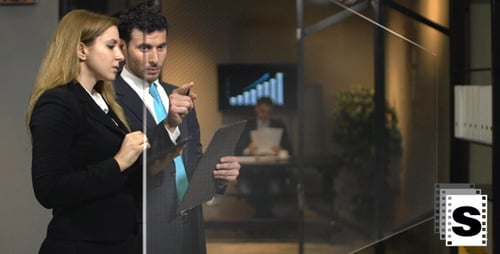 Business People Using Tablet in Modern Office