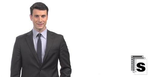 Confident Man in Suit Standing in Studio