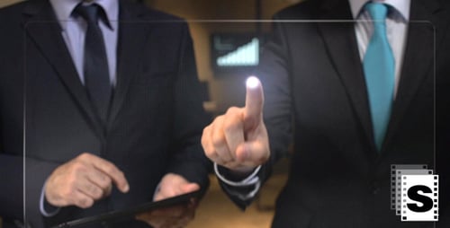 Workers In Office With A Digital Screen
