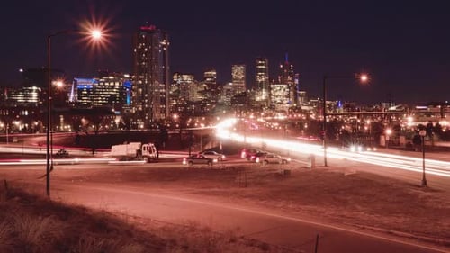 Cinemagraph of Busy Highway with Traffic Speeding Past at Night