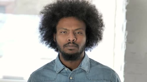Portrait of Young Adult with Curly Hair