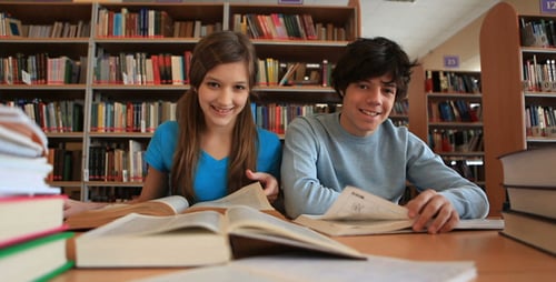 Teens working at library