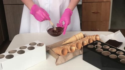 Confectioner Stirring Melting Chocolate for Ice Cream