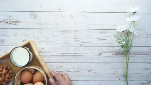 Bananas, Almonds, Eggs, and Milk on Tray