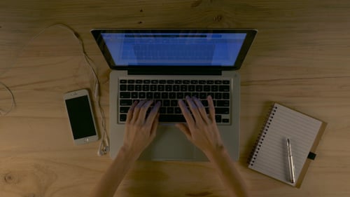 Typing On Laptop