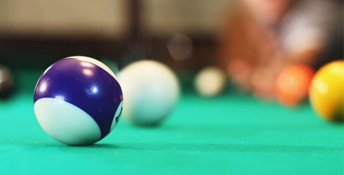 Man Plays Billiards