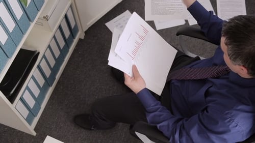 Businessman Working with the Documents and Crumpli