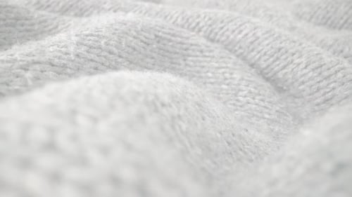 Extreme Detail View of Sheep Wool Cloth Texture Flowing in Macro Dolly Shot