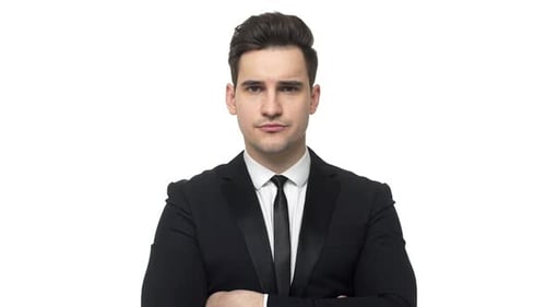 Serious Man in Suit with Arms Crossed