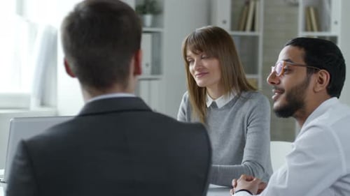 Multiethnic Colleagues Having Business Discussion at Office Meeting