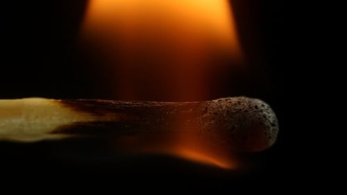 Macro Shot of a Match Igniting and Burning