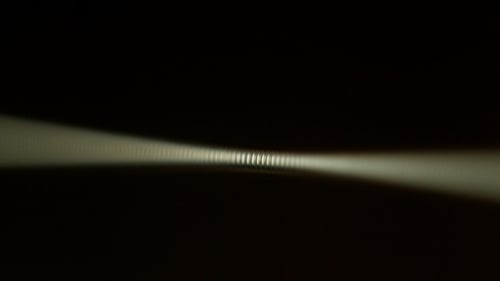 Abstract White Line Design on Dark Background