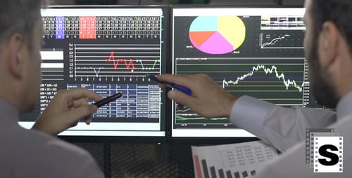 Traders Analysing Stock Market