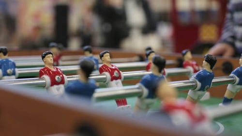 Young Men Playing Table Football