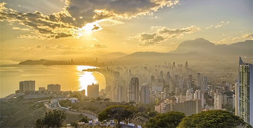 Rays of Light over Modern City Beach Skyline