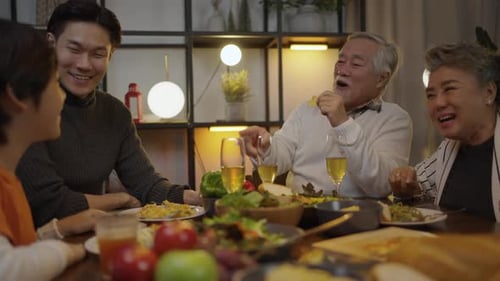 Happy Family Sharing Dinner at Home