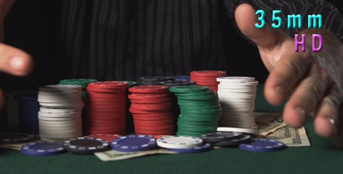 Poker Chips and Currency Win on Gaming Table