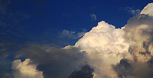 Dramatic Clouds Moving in a Deep Blue Sky