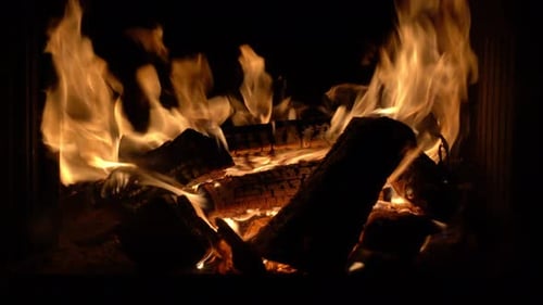 Cozy Fireplace Flames in a Dark Setting