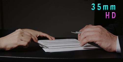 Business People Discussing Contract and Signing Documents