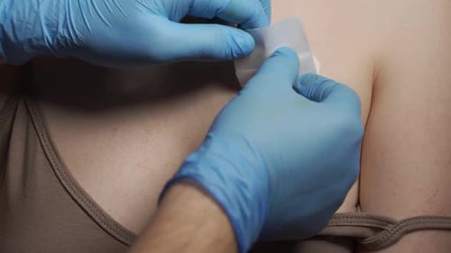 Bandaid Applied to Post Surgery Stitch