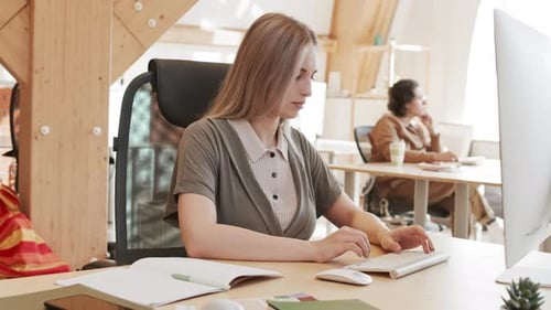 Portrait of Caucasian Businesswoman Working in Office