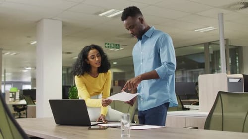 Business Colleagues Working Together in a Modern Office