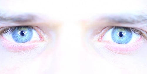 Intense Extreme Close-up of Bright Human Eyes