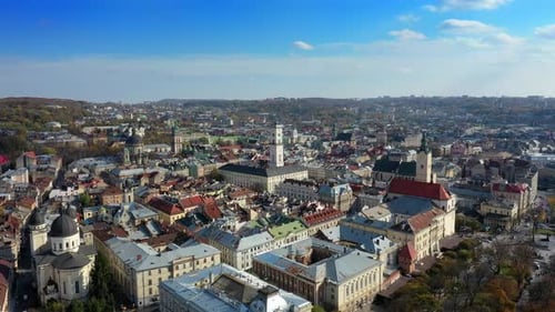 Aerial Drone Video of Lviv Old City Center - Roofs and Streets, City Hall Ratusha