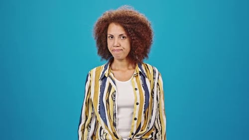 African American Woman with Kinky Hair Feels Disappointed