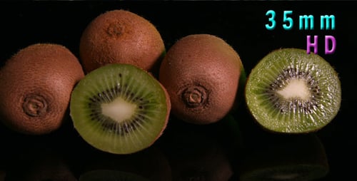 Kiwi Fruits on Reflective Black Surface