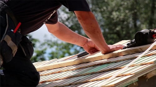 Roofers Installing Cedar Wooden Shingle Roof
