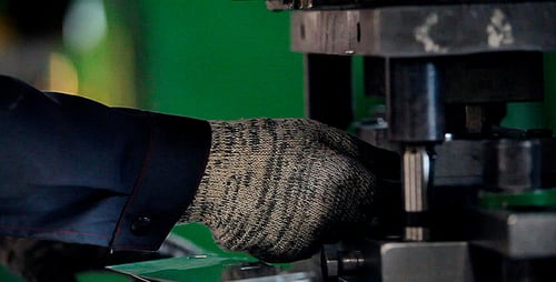 Machine in an Industrial Plant Makes Holes