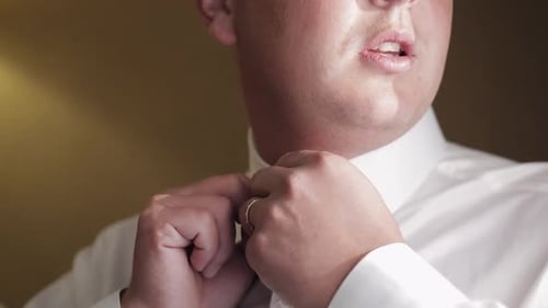 Man Buttons White Shirt Collar Before Wedding