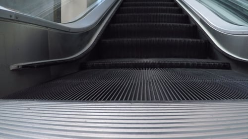 Moving Escalator in an Urban Setting